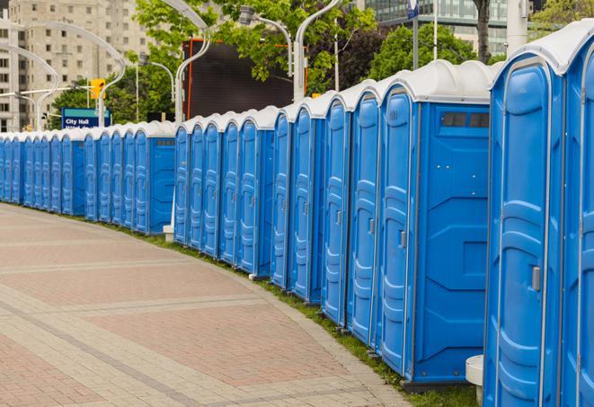 hygienic portable restrooms lined up at a music festival, providing comfort and convenience for attendees in Matlacha FL